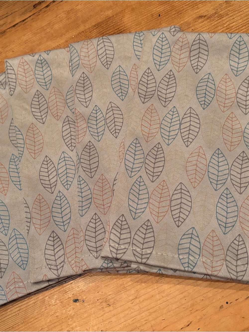 Neutral Leaf-Print Table Runner in Blue, Gray, and Tan